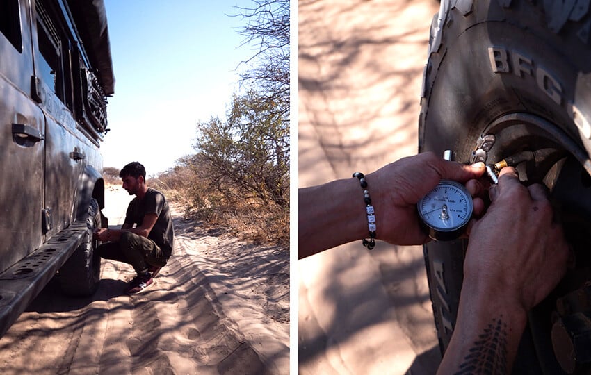 Tire pressure check, sand road, Namibia