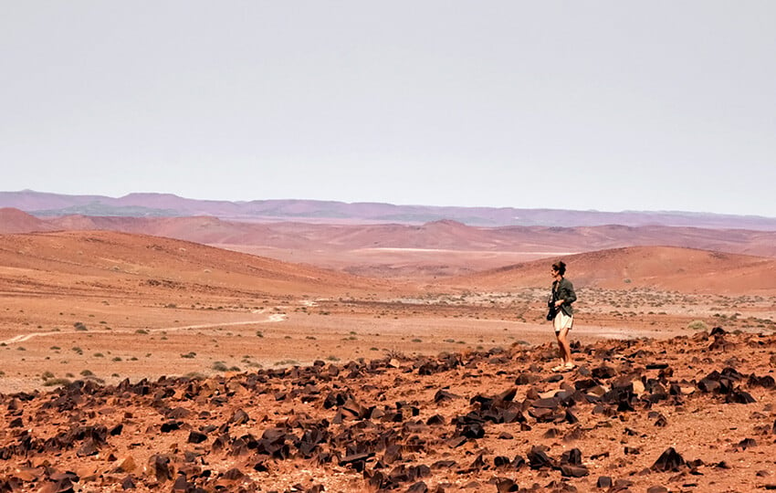 Woman overlooking the vast Namibian landscape