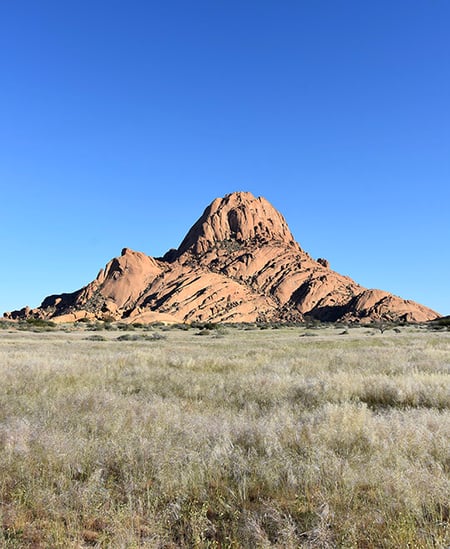 Spitzkoppe, grass, blue sky, Namibia_Janke Murray