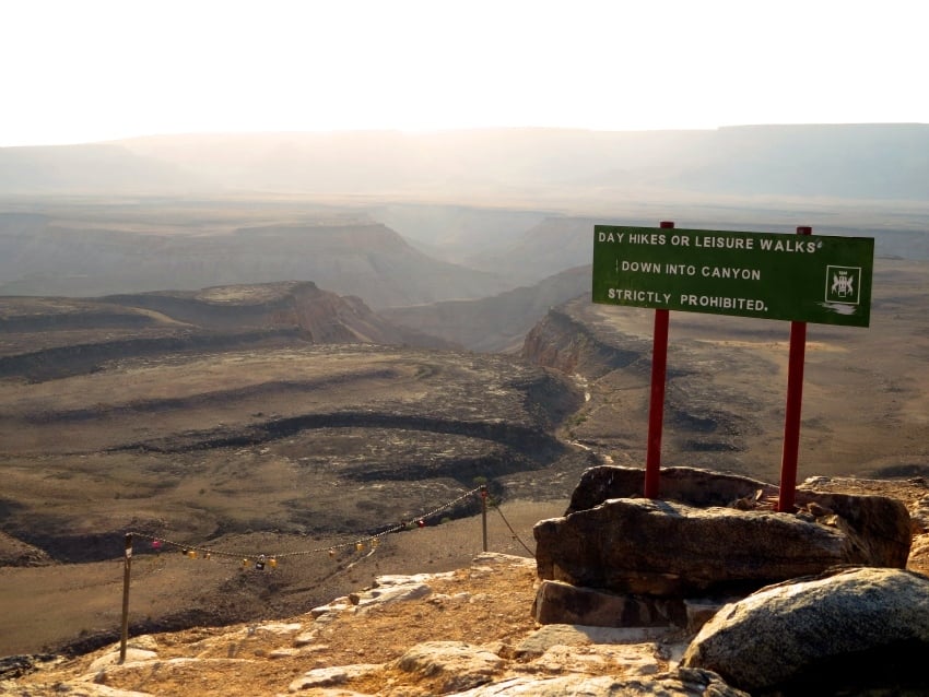 Scenic desert canyon landscape with layered cliffs and winding formations at Fish River Canyon in Namibia