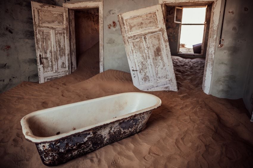 Interior of bathroom in one of the old houses at Kolmanskop.  Kolmanskop