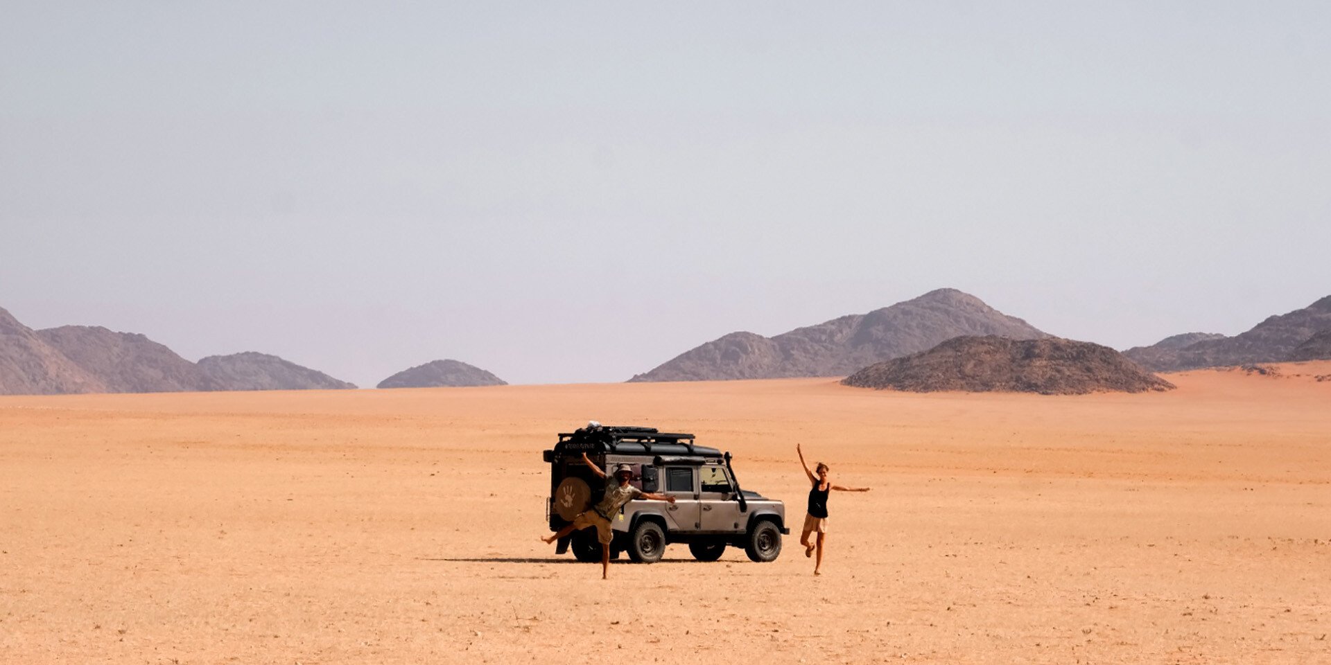 Two people, Jeep, Namib Desert, Namibia