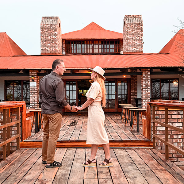 Couple at Etosha Safari Lodge, Namibia, photo by HerbapatiStyle