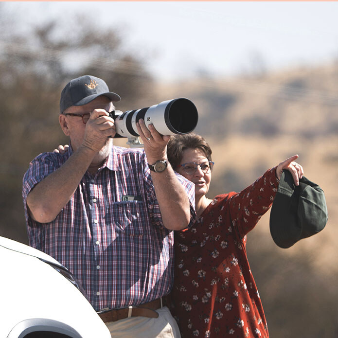 Couple taking a photo, Namibia